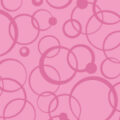 ピンク色の様々なサークルが重なりあうパターン