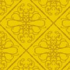 格子状にくぎられた金色のアラベスク柄パターン